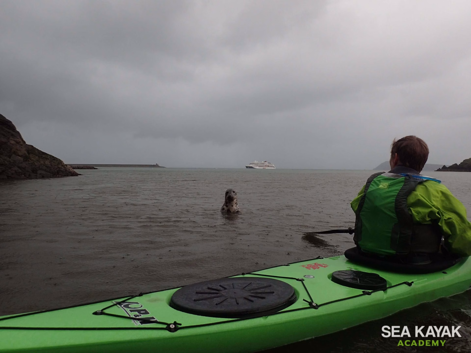 Women enjoying a coached sea kayaking retreat on the Pembrokeshire coast