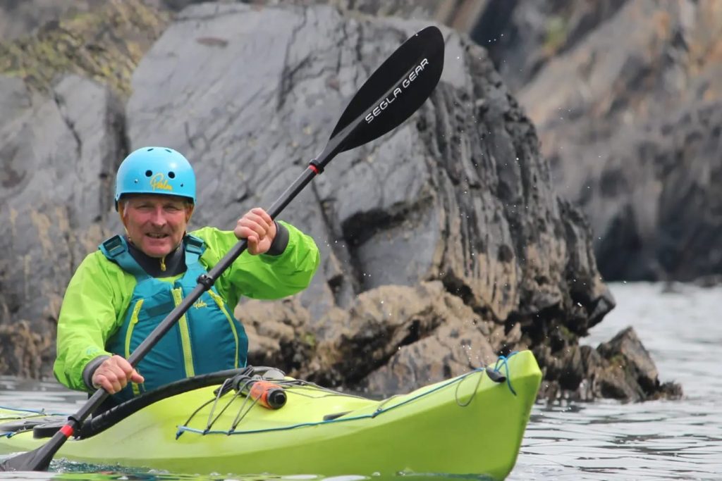 A sea kayaker refining technique during Development training on the Pembrokeshire coast